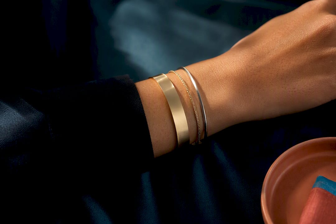 Restrained bracelet stack on a wrist