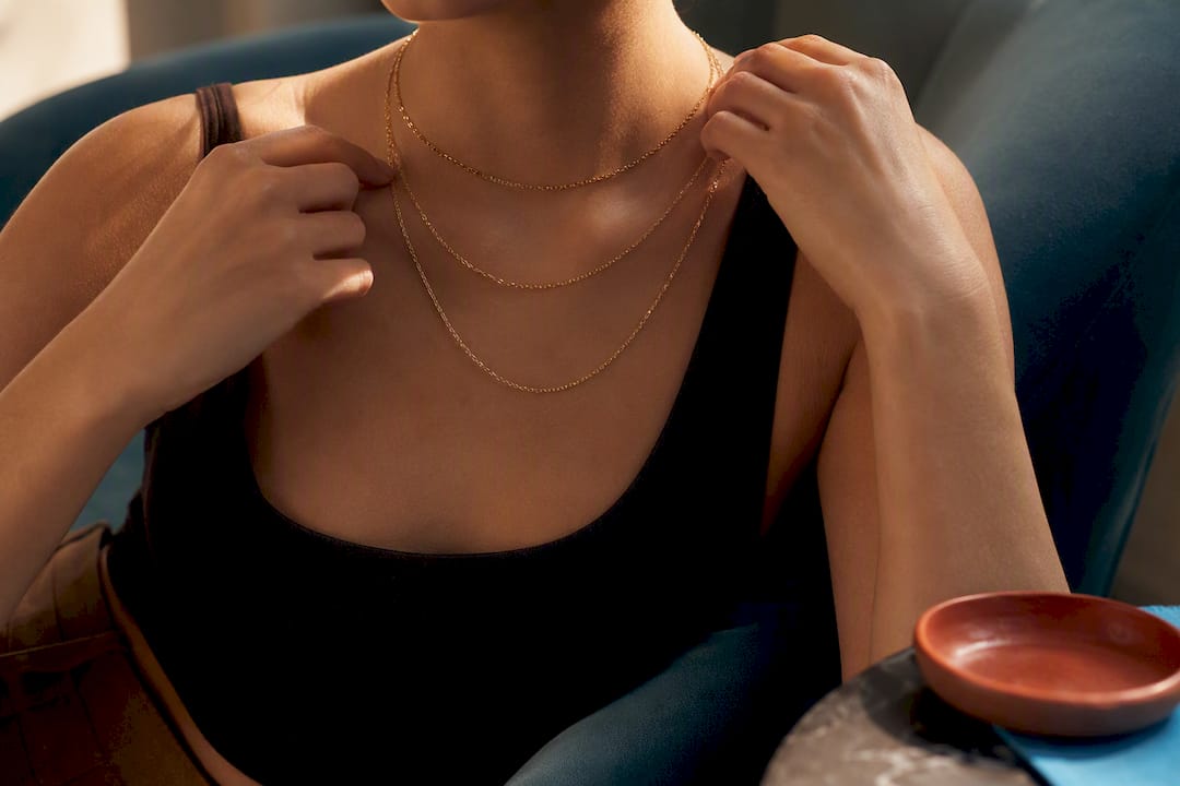 Cropped neckline with separated necklace layers