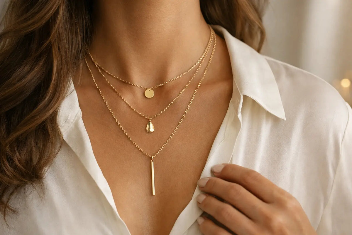 How to Layer Gold Necklaces With Elegance
